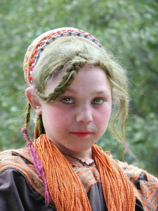 A Kalash girl (Indo-Iranian). In South/Central Asia, the European Steppe genome component is found at highest frequencies among the Kalash of Pakistan. Kalash individuals have been observed to bear as high as 50% of Yamnaya-related ancestry, a Steppe percentage typical for many areas in western Europe. This heritage is often reflected in the physiognomy of Kalash individuals, who are frequently pale-skinned and blond or red-haired, with light-colored eyes -- all traits inherited from their European Steppe ancestors.